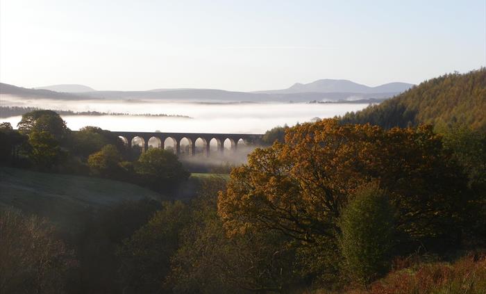 The View of the Cynghordy Viaduct with the Black Mountain and Brecon Beacons from the Patio and some of our bedrooms